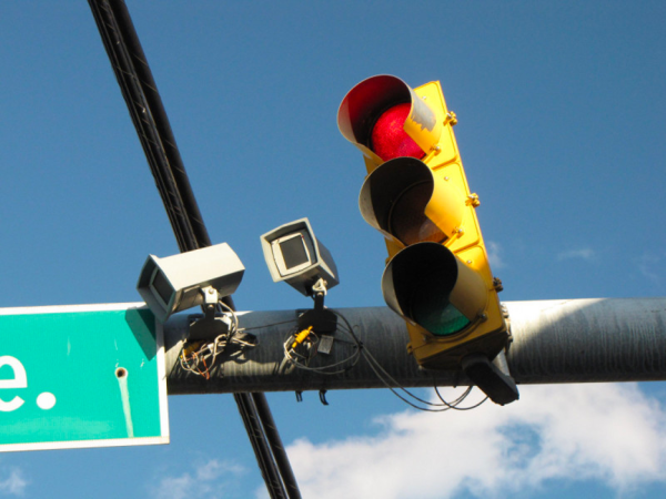 Traffic Cameras, Road Safety Aids, or Civil Rights Violations?       